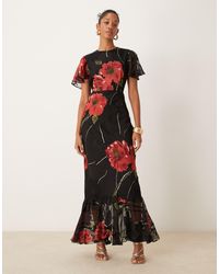 ASOS - – gestuftes maxikleid mit trompetenärmeln, rüschen und plakativem floralem ausbrennermuster - Lyst
