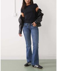 Weekday - Low Waist Flared Jeans With Zip Closure - Lyst