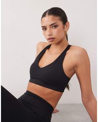 4505 - Active Push Up Medium Support Sports Bra - Lyst