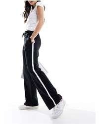 New Look - Joggers negros con raya lateral - Lyst