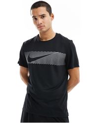 Nike - – flash dri-fit miler – reflektierendes t-shirt - Lyst