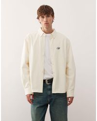 Prohibited - Chemise oversize boutonnée à manches longues avec logo - crème - Lyst
