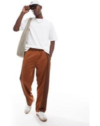 Pull&Bear - Joggingbroek Met Wijde Pijpen En Strepen - Lyst
