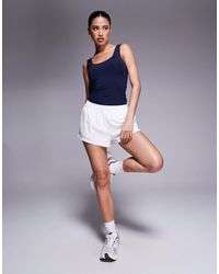 4505 - Micro High Waist Woven Running Shorts With Liner - Lyst