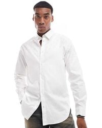 ARMANI EXCHANGE - All Over Logo Printed Long Sleeve Shirt With Satin Shine Effect - Lyst