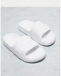 adidas Originals - Sandales à enfiler adilette 22 blanches - Lyst