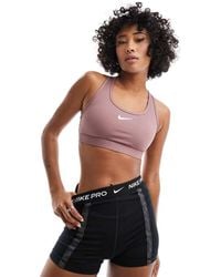 Nike - Mini Swoosh Medium Support Sports Bra - Lyst