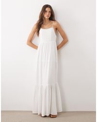 Mango - Teen - robe longue à volants étagés et bretelles fines avec bordures ornementés - Lyst