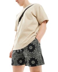 ASOS - – weite, kurze shorts mit elastischem bund und paisley-muster - Lyst