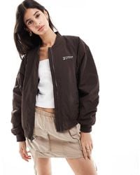 New Balance - Linear Heritage Woven Bomber Jacket - Lyst