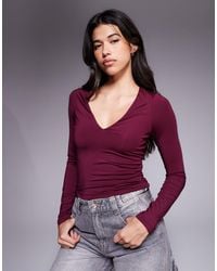ASOS - – langärmliges, zweilagiges oberteil - Lyst