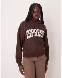 Abercrombie & Fitch - Sweat à capuche avec motif graphique - marron - Lyst