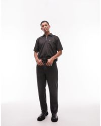 TOPMAN - Polo elegante oversize nera con tasca con zip - Lyst