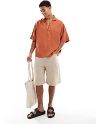ASOS - Chemise oversize coupe carrée à enfiler avec bords effilochés - rouille - Lyst