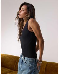 GOOD AMERICAN - Sculpting Deep V Tank Bodysuit - Lyst
