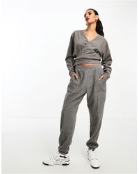 ASOS - Joggers antracite mélange super morbidi con cuciture a vista - Lyst