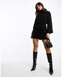 Vila - Robe pull courte à col roulé avec lien à nouer à la taille - Lyst