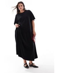 ASOS - Asos design curve - robe mi-longue évasée en velours à larges côtes et nouée dans le dos - Lyst