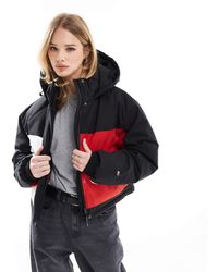 Tommy Hilfiger - Doudoune effet color block à logo au dos - multicolore - Lyst