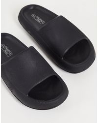 Truffle Collection Sandals, slides and 