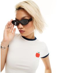 Motel - T-shirt ristretta bianca con mela e righe a contrasto sui bordi - Lyst