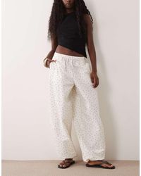ASOS - Broek Van Katoen En Nylon Mix Met Elastische Taille En Ballonpijpen En Stippen - Lyst