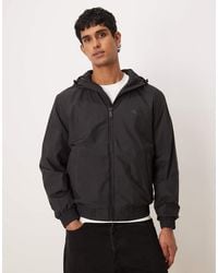Calvin Klein - Chaqueta Negra Impermeable Con Capucha De Tejido Antidesgarros De - Lyst