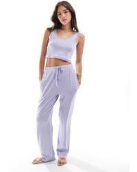 Brave Soul - Geribbelde Set Van Cropped Hemdje Met Kanten Rand En Broek Met Wijde Pijpen - Lyst