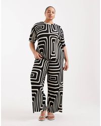 ONLY - Pantalon d'ensemble ample en tissu plissé à imprimé abstrait - Lyst