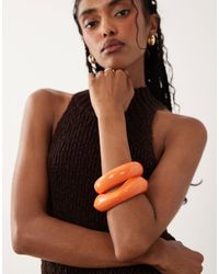 ASOS - – 2er-pack armreifen aus kunstharz - Lyst