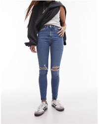 TOPSHOP - High Rise Jamie Jeans With Rips - Lyst