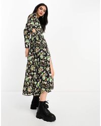 Mango - Vestido Negro Y Verde De Manga Larga Con Estampado Floral Y Aberturas En La Pierna Y Los Laterales De - Lyst
