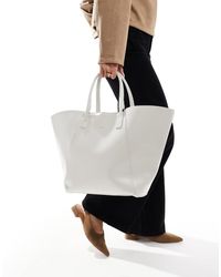 PASQ - Tote Tas Met Vleugels - Lyst