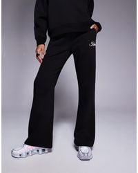 Kaiia - Cotton Rich Script Logo Wide Leg jogger Co-ord - Lyst