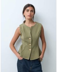 ASOS - Interlock Sleeveless Peplum Top With Gold Abstract Button Detail - Lyst