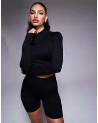 4505 - Icon Seamless Rib Knit 1/4 Zip Long Sleeve Top - Lyst