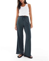 ONLY - Pantalon ample texturé noué à la taille - gris - Lyst