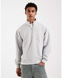 Levi's - Tonal Embroidered 1/4 Zip Sweatshirt - Lyst
