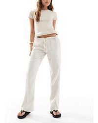 Roxy - Oceanside Flared Trousers - Lyst