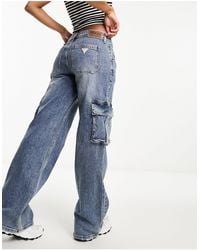 Guess - Jeans cargo lavaggio medio - Lyst