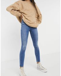 Vero Moda - Sophia - jean skinny taille haute effet usé - moyen - Lyst