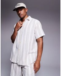 ADPT - Chemise oversize à rayures texturées - crème - Lyst