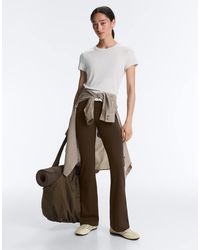 Oysho - High-Rise Comfortlux Flare Trousers - Lyst
