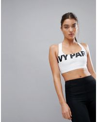 lyst ivy park hooded bodysuit in green ivy park plus size