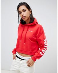 Calvin Klein Hoodie With Oversized Logo On Sleeve - Red