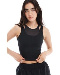 Nike - Nike – one training dri-fit – lagen-trägertop - Lyst