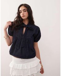 Reclaimed (vintage) - Top Vaquero Con Lavado Azul, Mangas Abullonadas Y Lazada Al Cuello De - Lyst