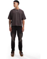 ASOS - Jeans Affusolati Nero Slavato Con Tinta - Lyst