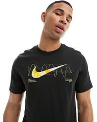 Nike - Camiseta negra con logo iykyk dri-fit - Lyst