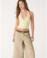 Stradivarius - Top dos nu à col v - pastel - Lyst